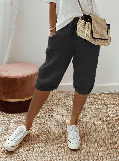Pantalon femme en coton et lin avec poches et taille élastique – pantacourt longueur mi-mollet.