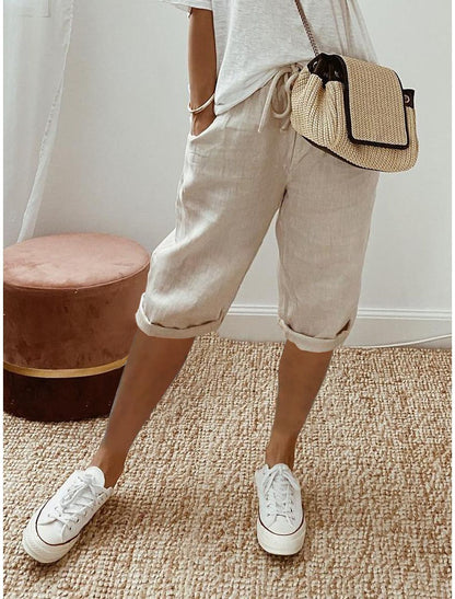 Pantalon femme en coton et lin avec poches et taille élastique – pantacourt longueur mi-mollet.